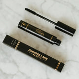Jennifer Lane Beauty's Lane Lashes mascara on a white marble surface